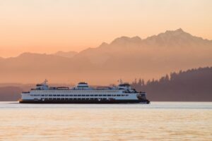 ferry-boat-crossing-water-at-sunset